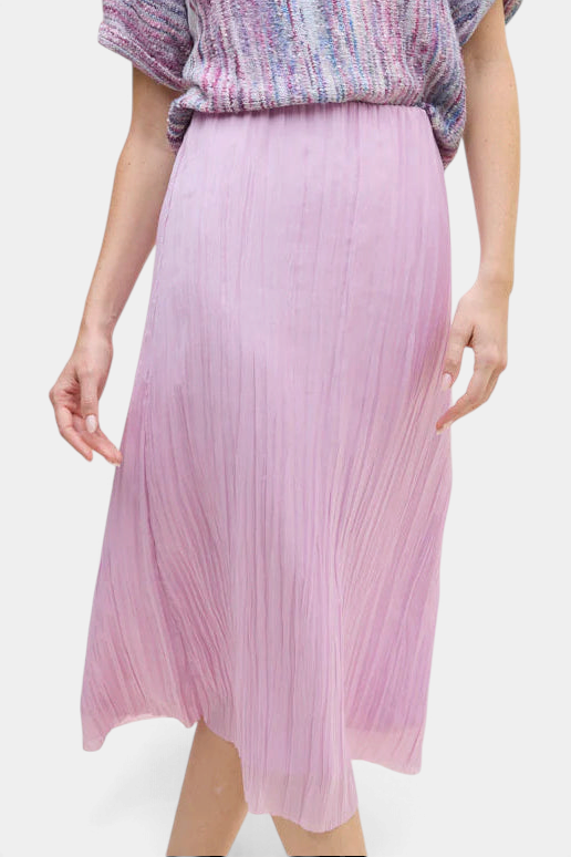 The Copper Shed Sabi Skirt in light pink with crinkle-pleated texture and an elastic waistband.