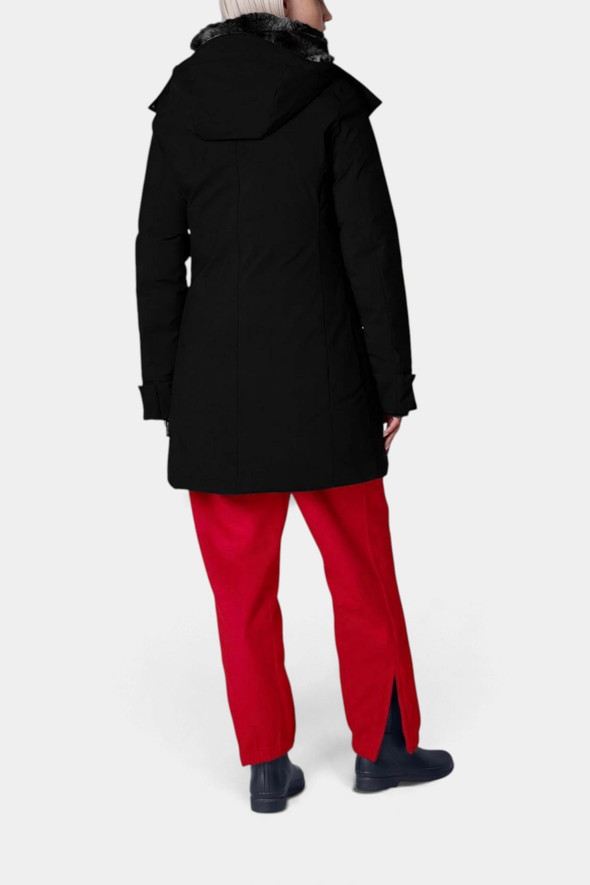 The Copper Shed Samantah Parker jacket in black with a faux fur hood, shown from the back on a model.