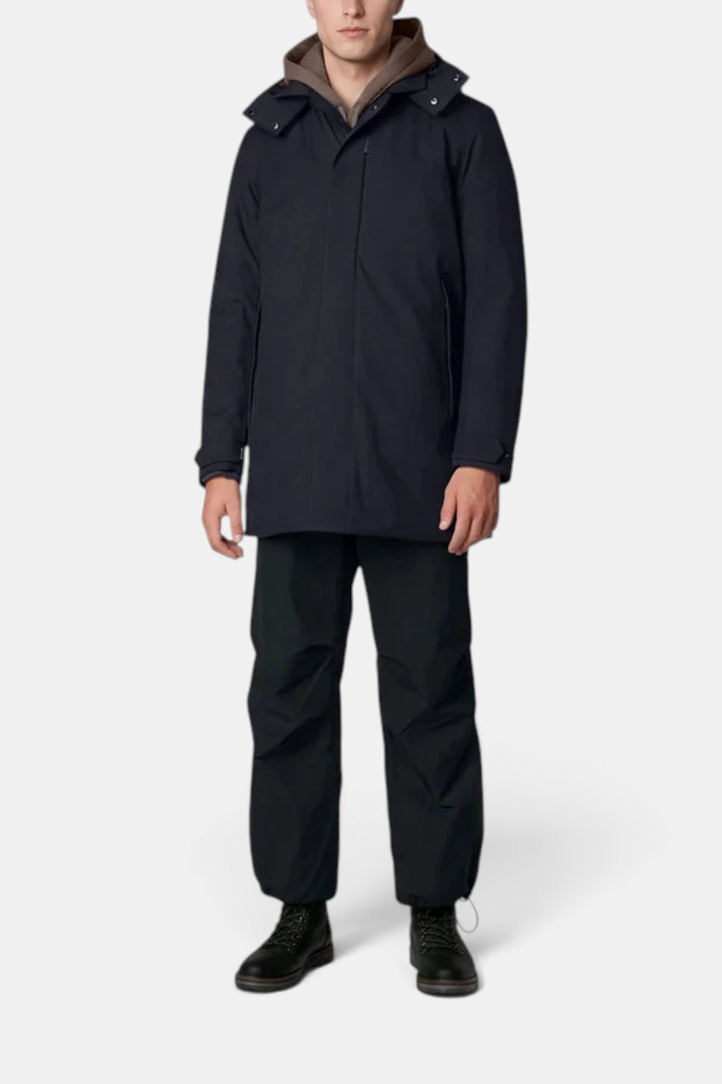 The Copper Shed men's navy waterproof Sid jacket with a removable hood and layered brown collar, front view.