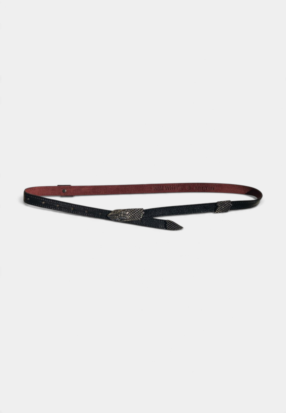 The Copper Shed skinny black leather belt featuring four antique nickel snake castings and a 3/4 inch wide strap.