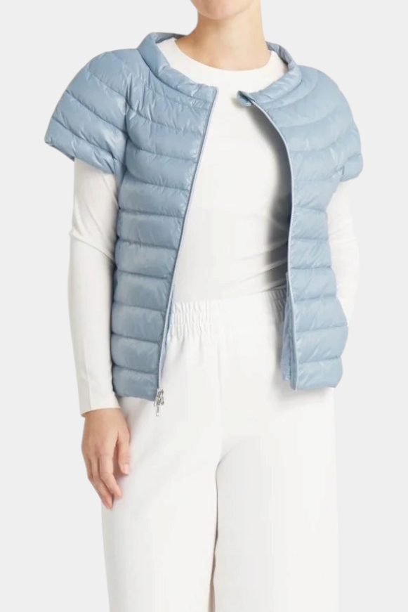 The Copper Shed St Ives light blue packable down vest with quarter sleeves and a two-way zipper.