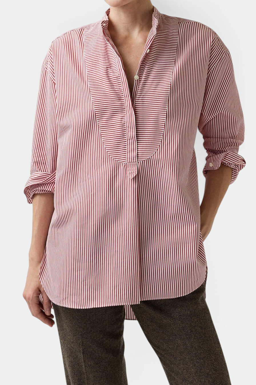 The Copper Shed Christiane tunic in red and white striped Italian cotton poplin with a bib-front and mandarin collar.