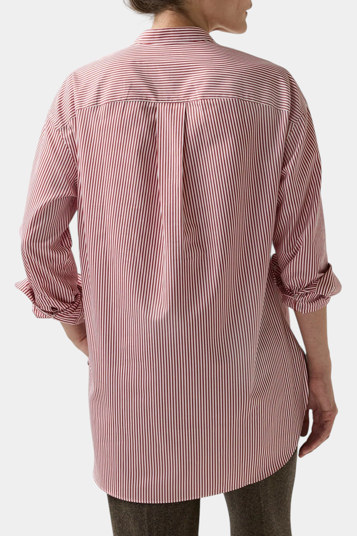 Back view of The Copper Shed Christiane tunic in red and white striped Italian cotton poplin with a high-low hem.
