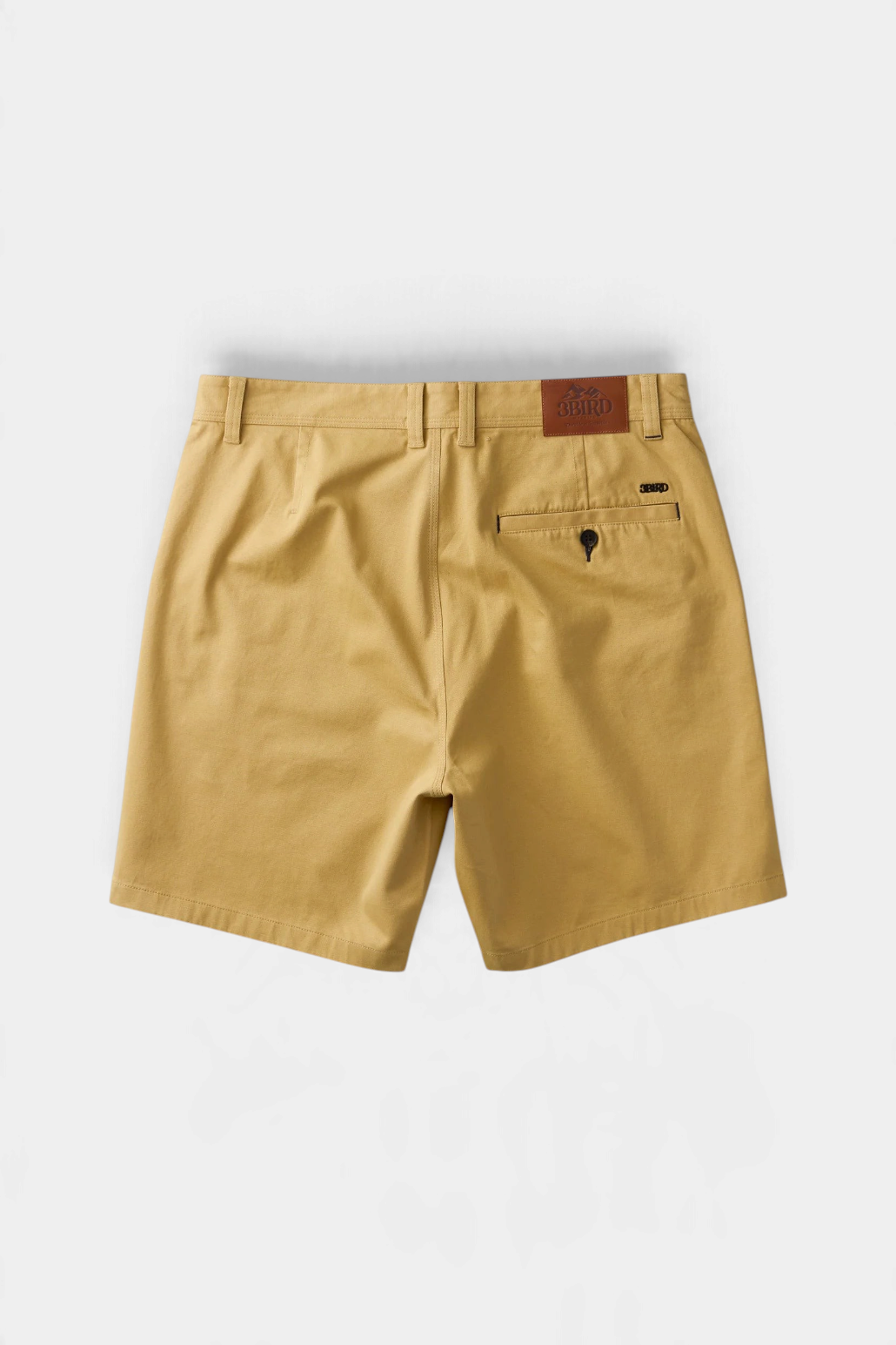 The Copper Shed Breakout broken twill shorts in tan organic cotton with a back welt pocket and branded leather patch.
