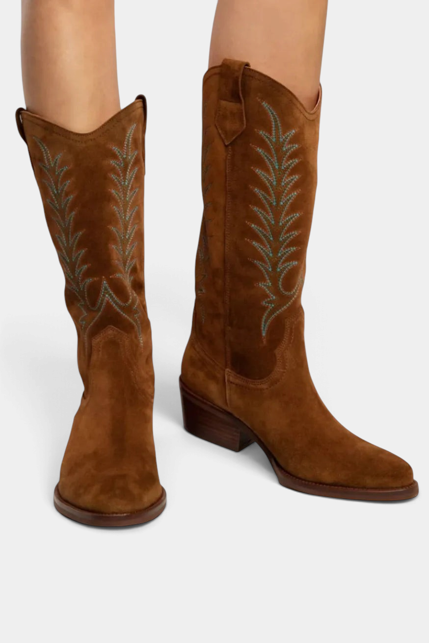 The Copper Shed Goldie mid-calf cowboy boots in tan suede with colourful Western embroidery and a stacked Cuban heel.