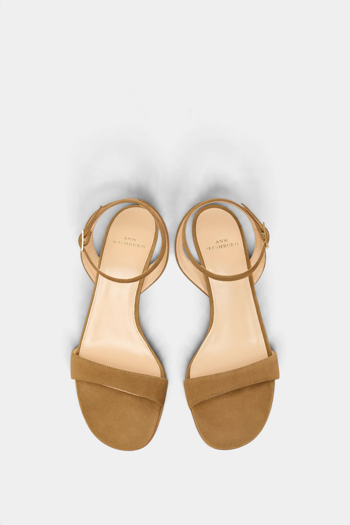 The Copper Shed tan Italian calfskin suede kitten heel sandals with an ankle wrap and buckle closure
