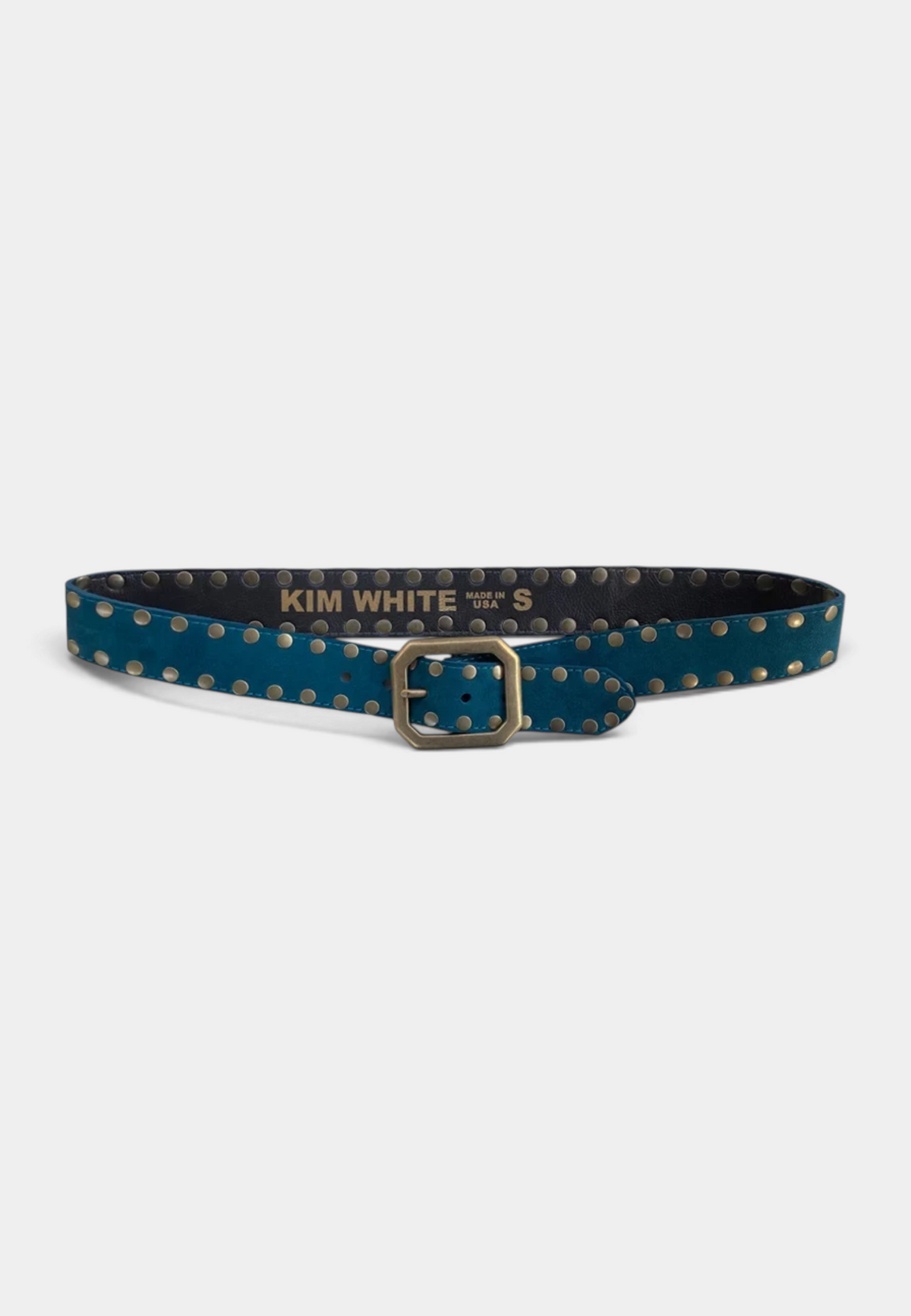 The Copper Shed teal suede belt featuring a squared-off buckle and decorative brass studs along the strap.