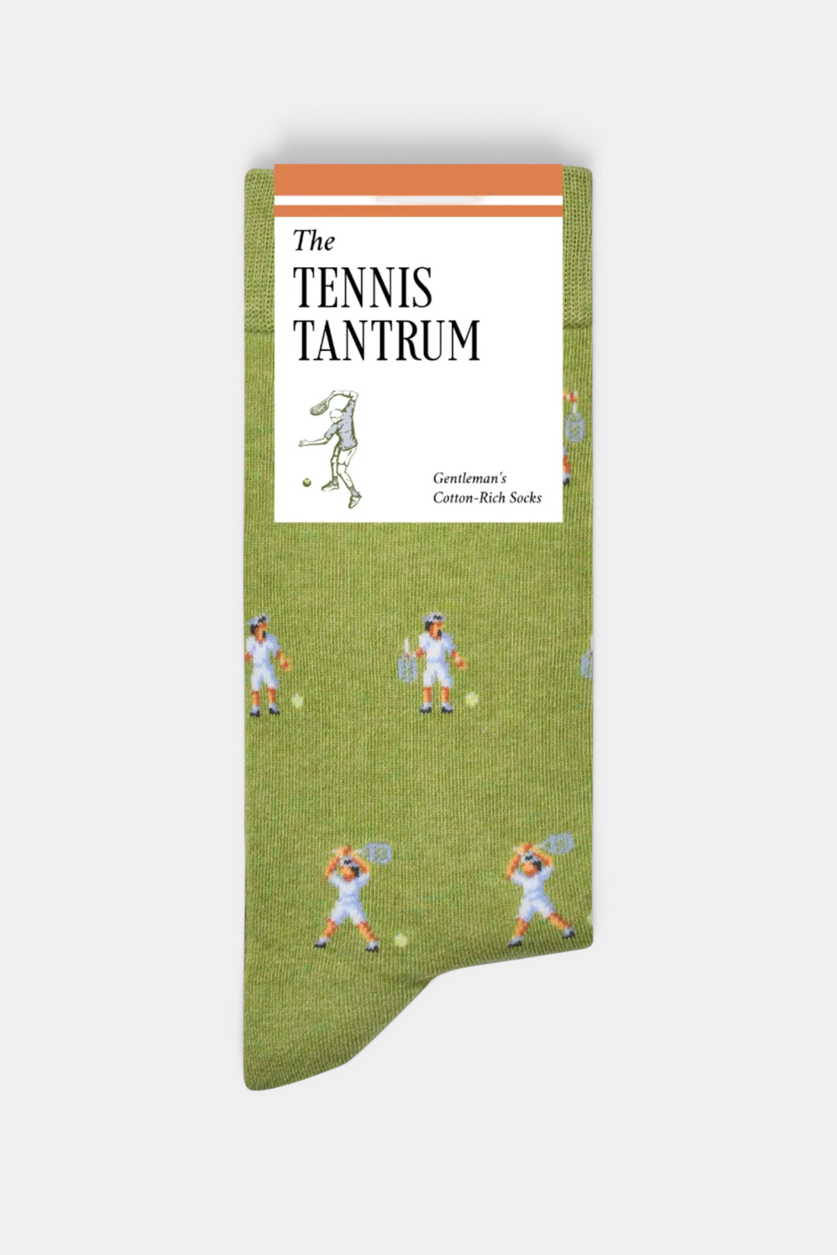 The Copper Shed Tennis Tantrum novelty socks in olive green cotton with a tennis player pattern