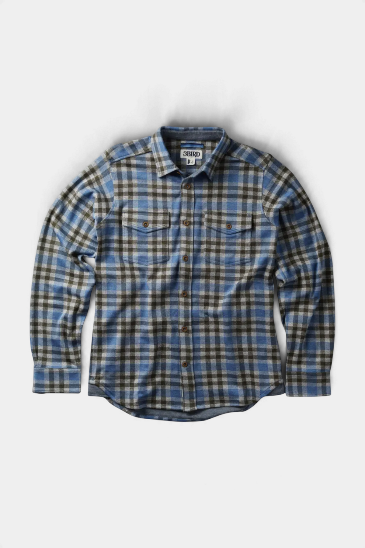 The Copper Shed Tidal knit shirt in a blue and grey plaid cotton-modal blend with dual chest pockets