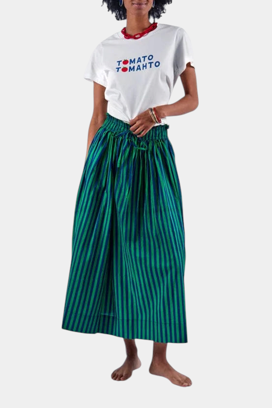 The Copper Shed white graphic t-shirt with Tomato Tomahto text paired with a green and blue striped midi skirt