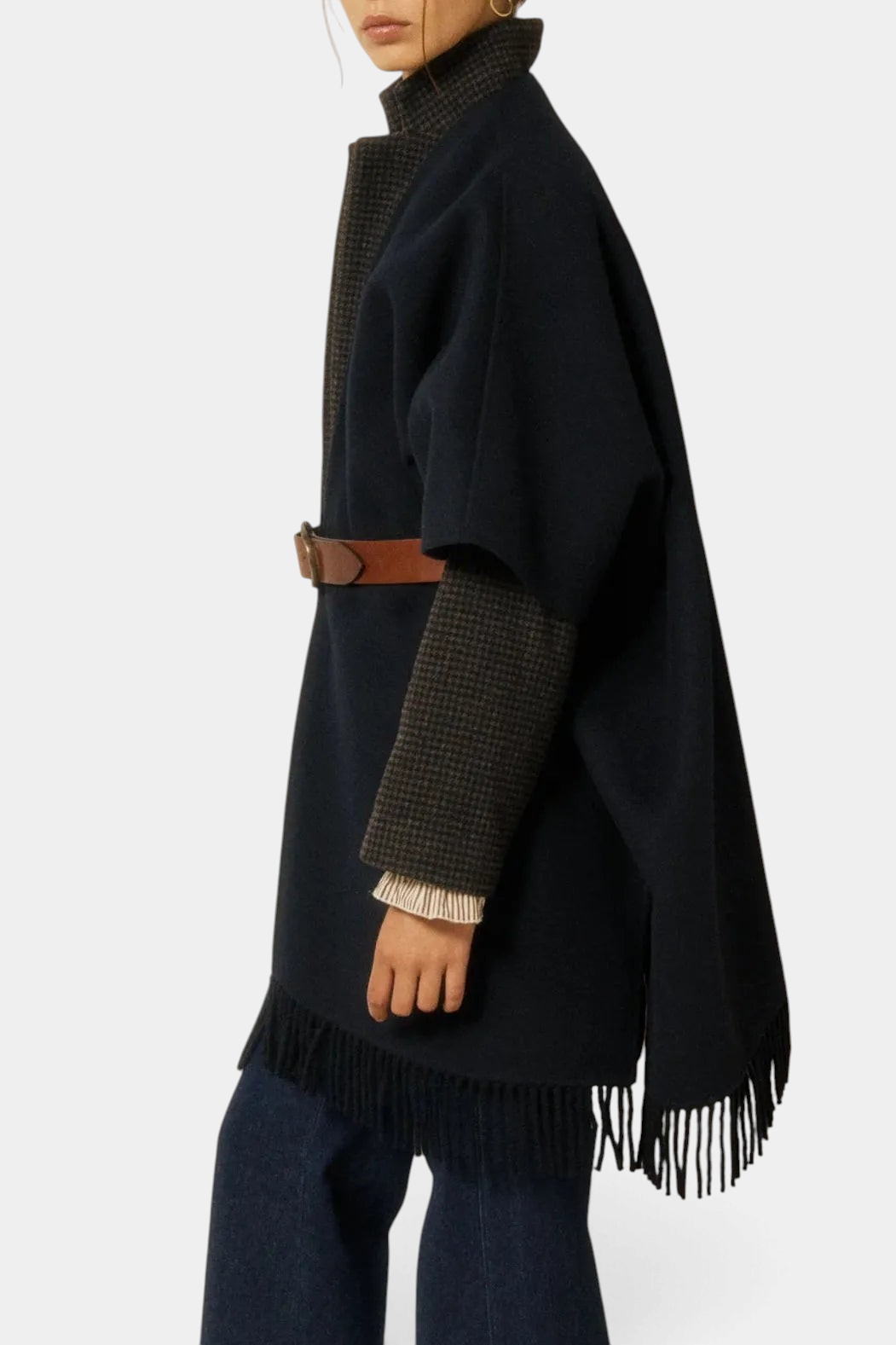 The Copper Shed Virginie navy blue double-faced wool cape with fringe hem and brown leather belt, side view