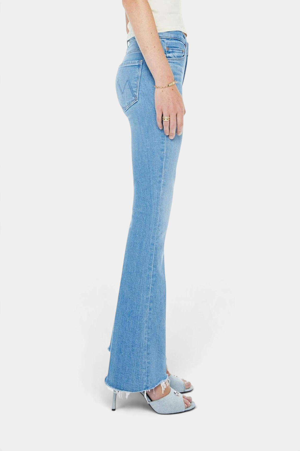 The Copper Shed The Weekender Fray light blue mid-rise flare jeans with frayed hem and subtle whiskering, side view
