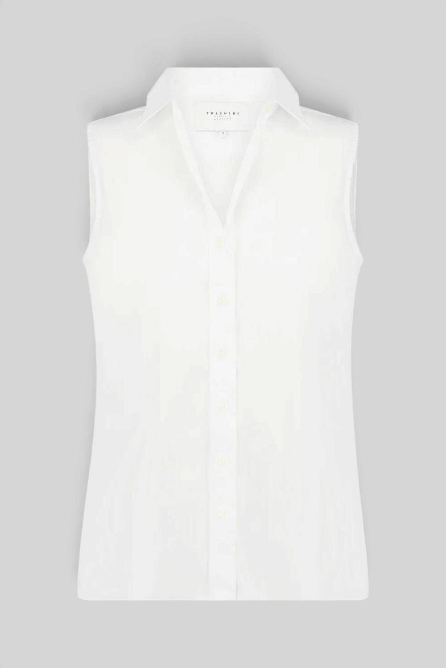 The Copper Shed white sleeveless button-down shirt in wrinkle-resistant poly crepe with a classic collar.