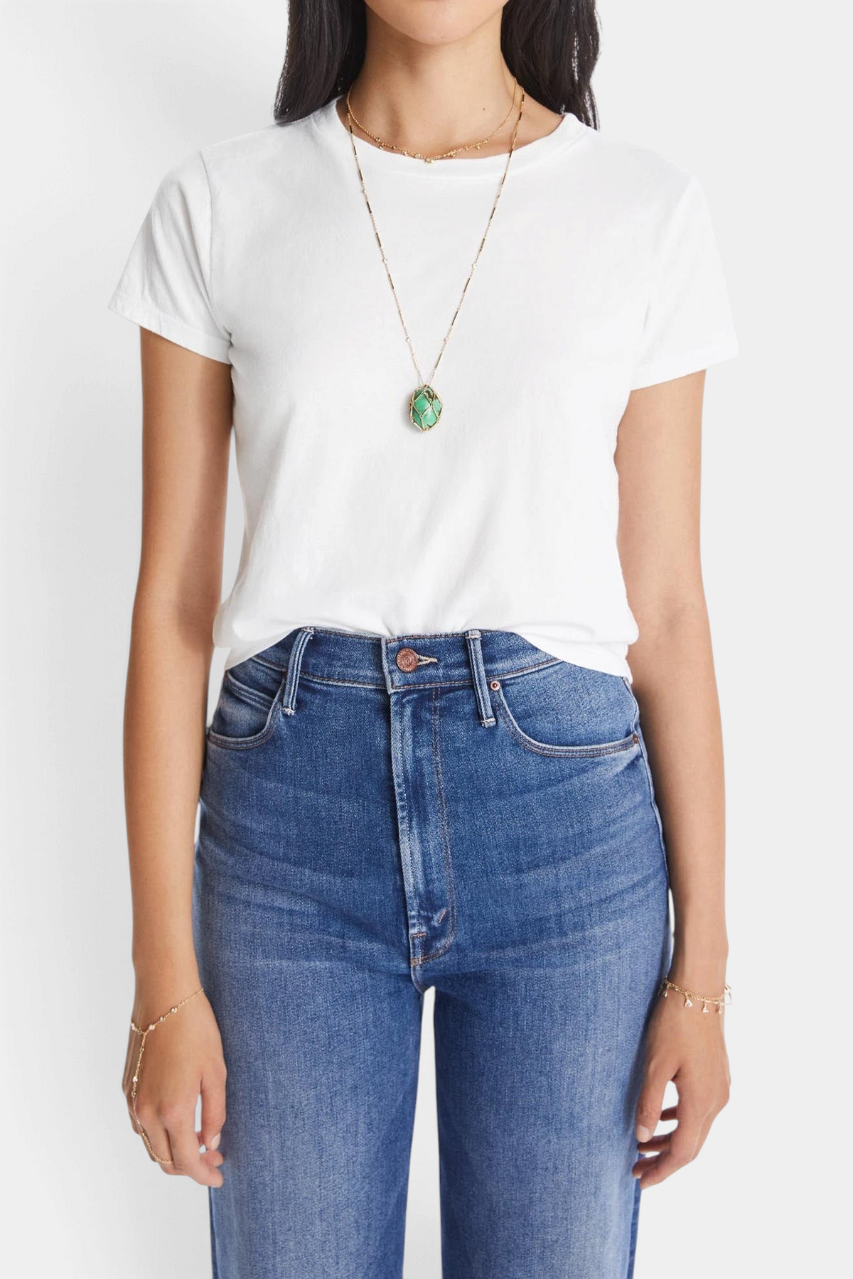 The Copper Shed bright white slim fit crewneck t-shirt in 100% supima cotton worn by a model with a green necklace.