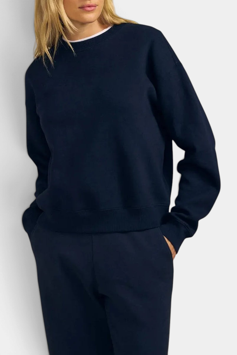 The Copper Shed Yoko sweatshirt in navy blue cotton fleece with a crew neck and relaxed drop shoulder fit.