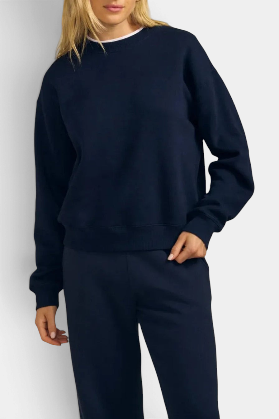 The Copper Shed Yoko sweatshirt in navy blue cotton fleece with a crew neck and relaxed drop-shoulder fit.