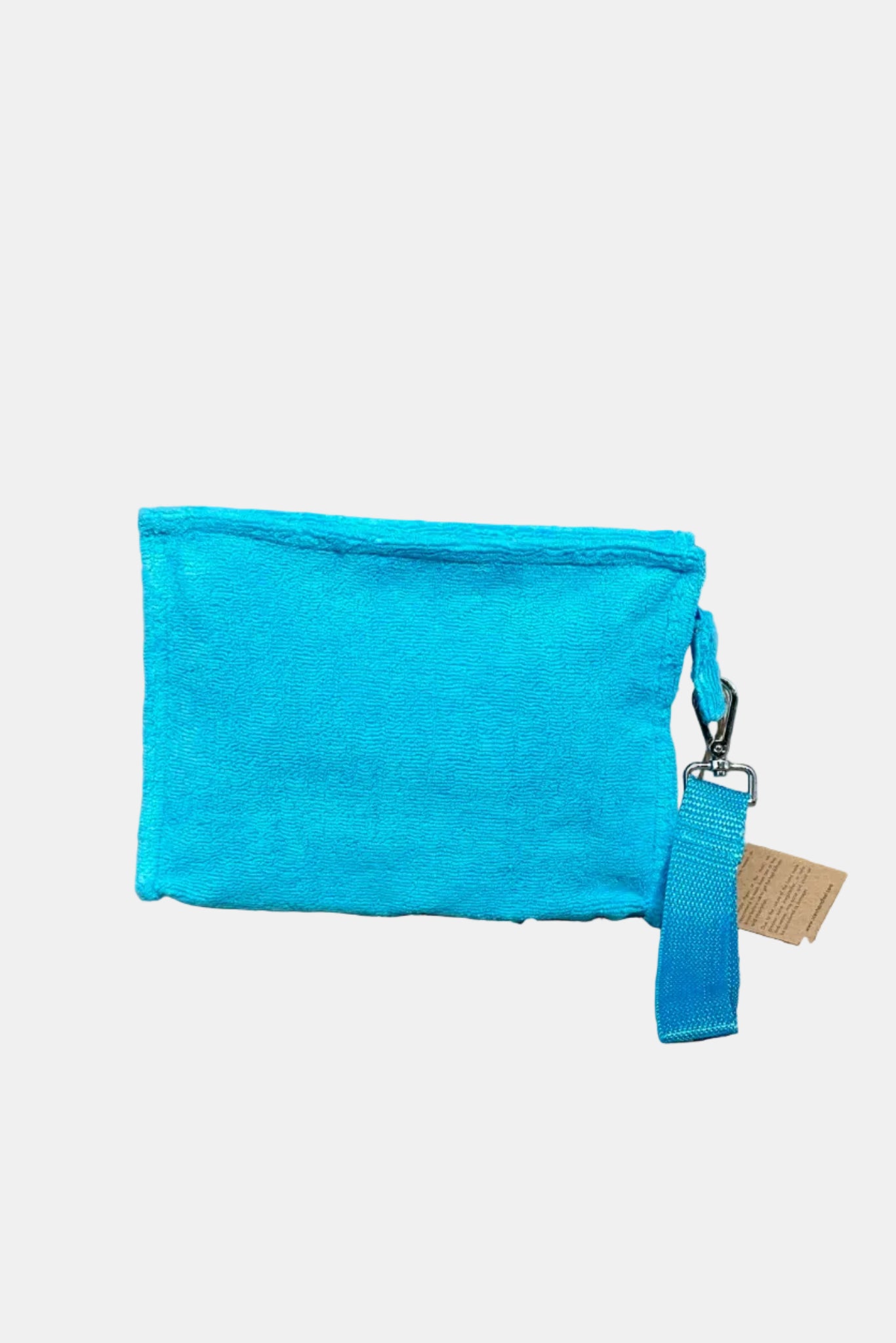 Blue pouch with a strap on a stone surface