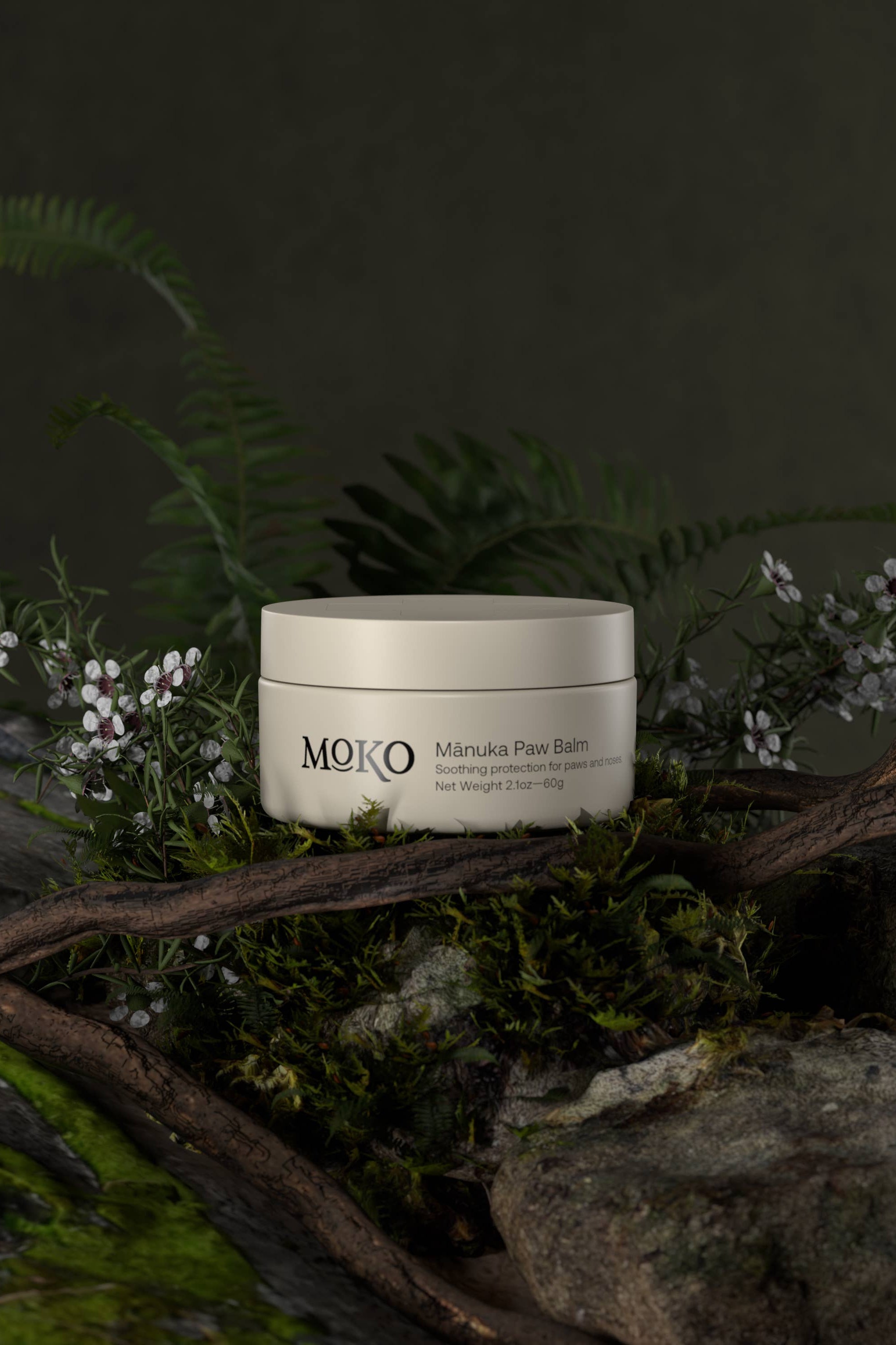 MOKO jar of Manuka Face Balm on a natural background with plants and rocks