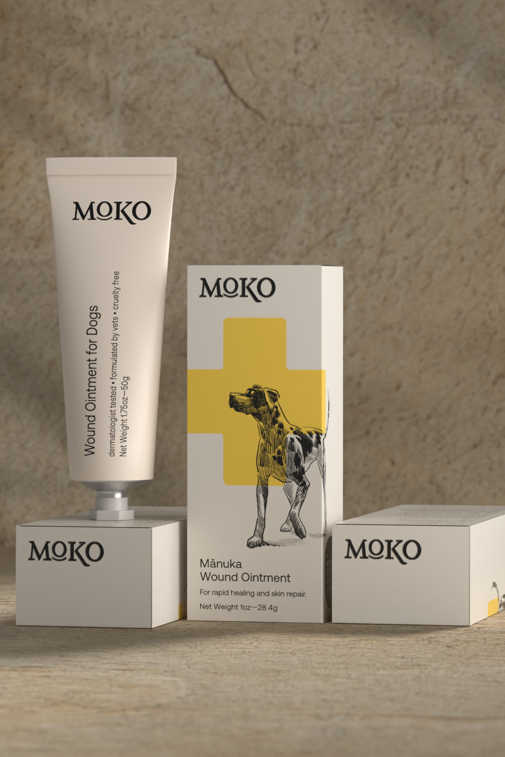 Moko wound ointment for dogs with packaging on a wooden surface and stone wall background