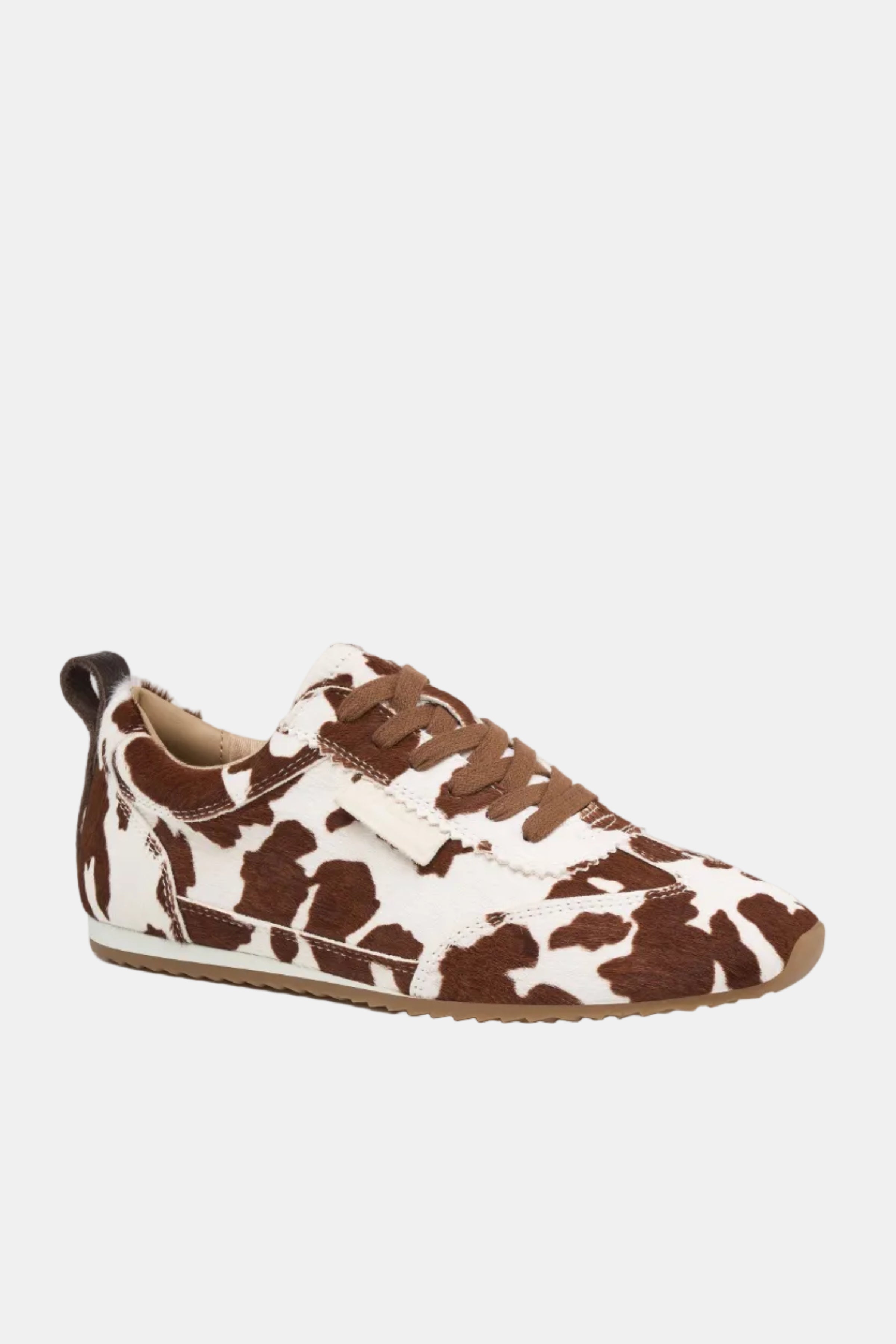 Brown and white cow print shoe on a white background