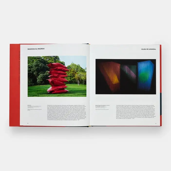 Open book showing two pages with images of sculptures and text.