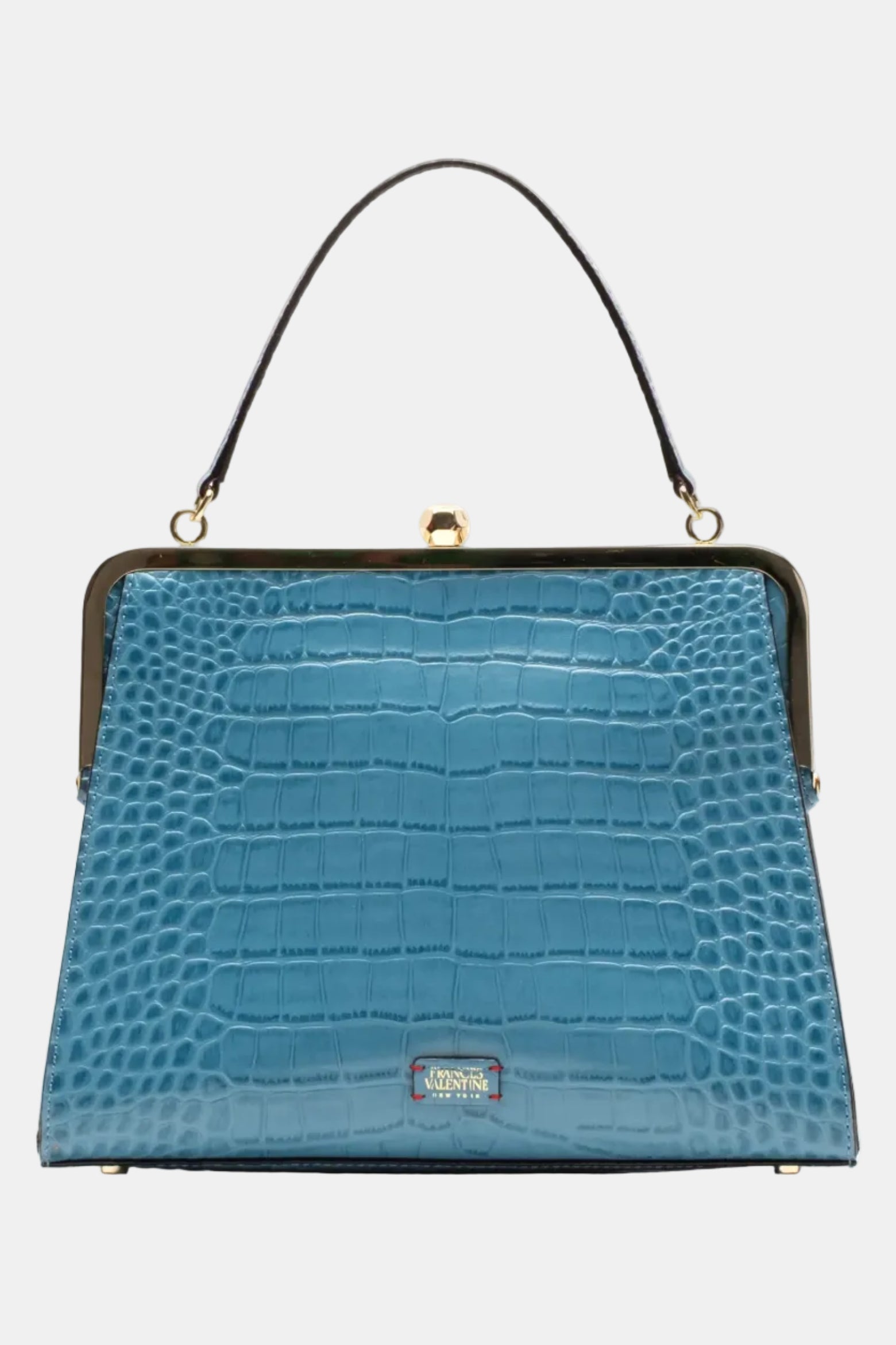 A blue crocodile-embossed leather handbag with a black top handle, gold-tone frame, and a small gold-tone logo plaque on the front.