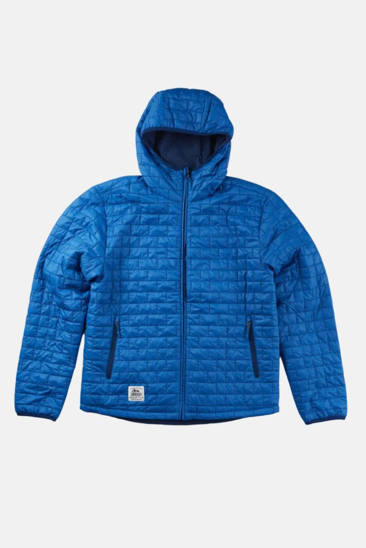 Blue quilted jacket on a light gray background