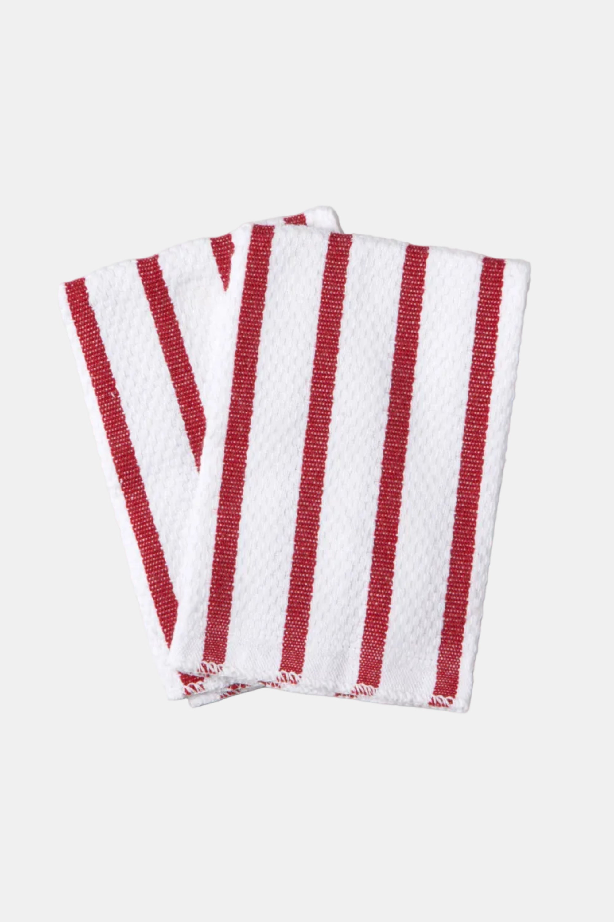 Red and white striped dish towels on a light gray background