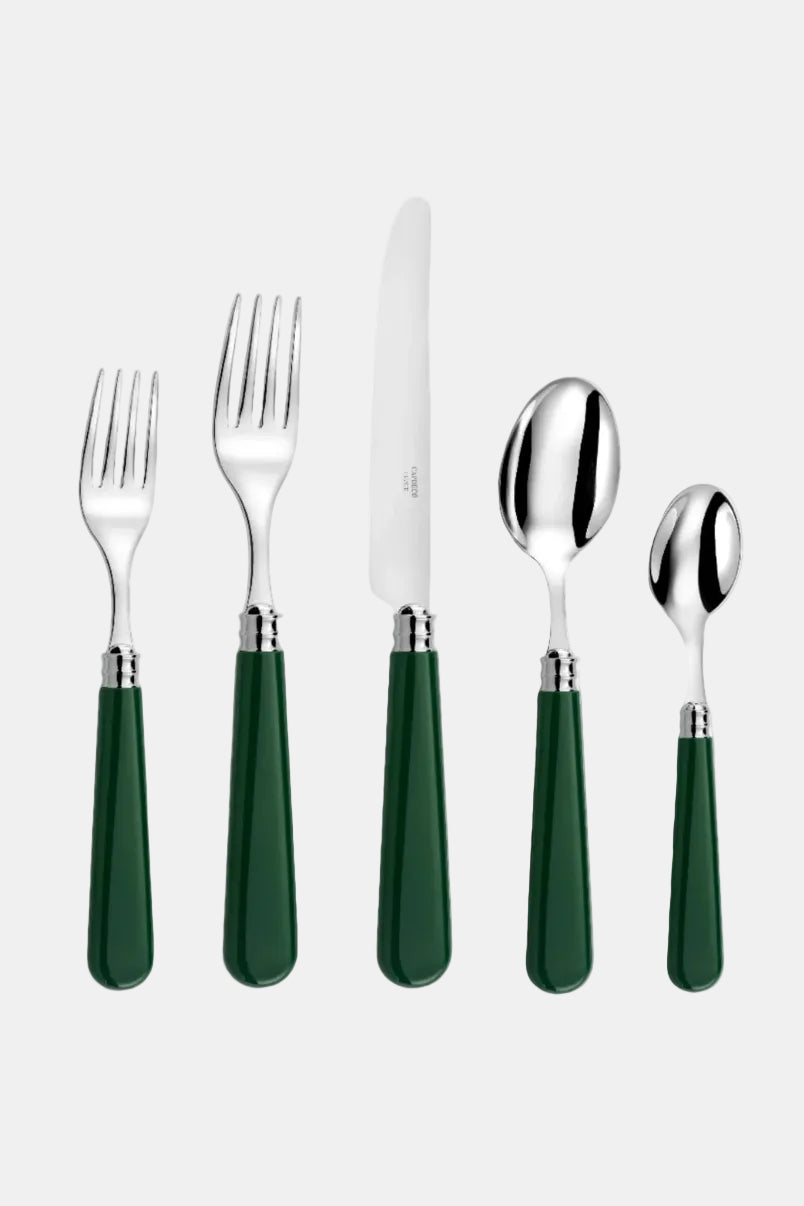 Set of silver cutlery with green handles on a white background