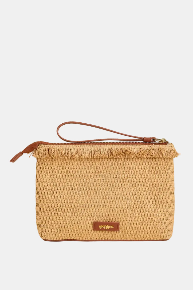 Woven clutch bag with brown handle and trim on a beige background