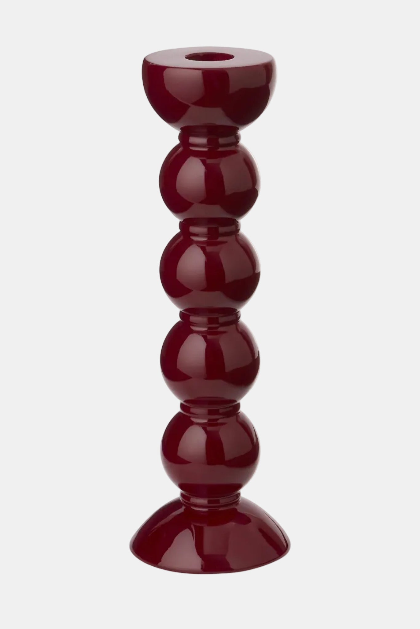 Red candle holder on a white background