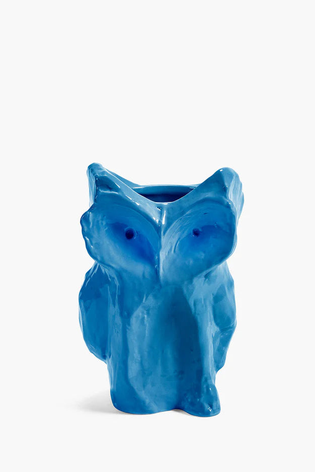 Blue ceramic owl-shaped vase on a white background
