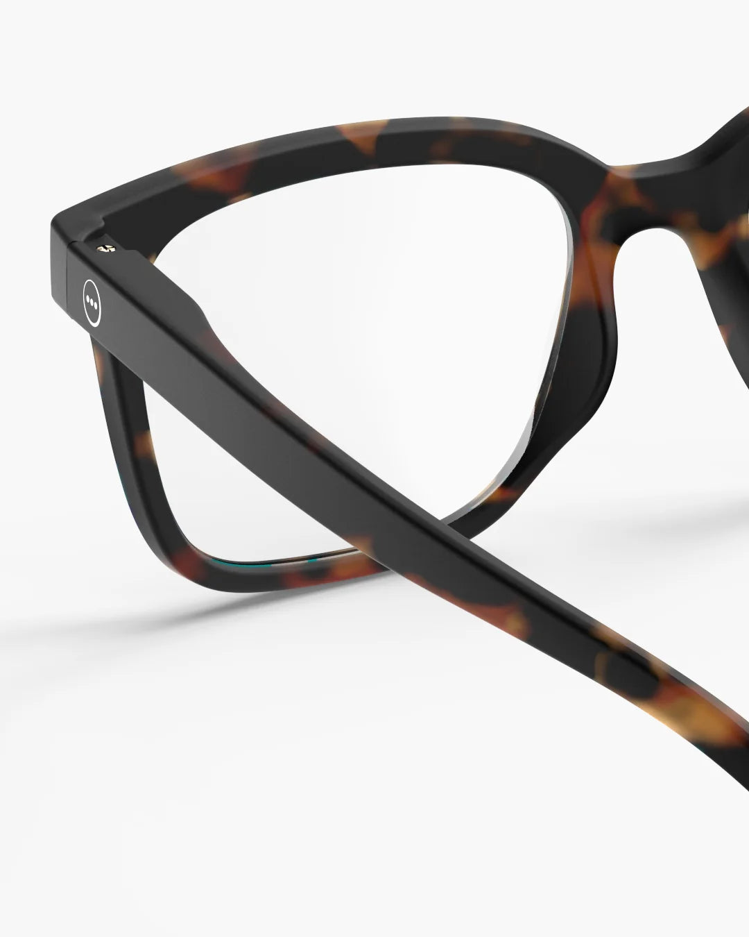 Glasses with tortoiseshell frame on a white background