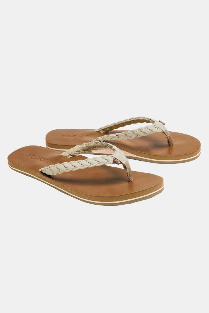 Pair of brown sandals with braided straps on a white background
