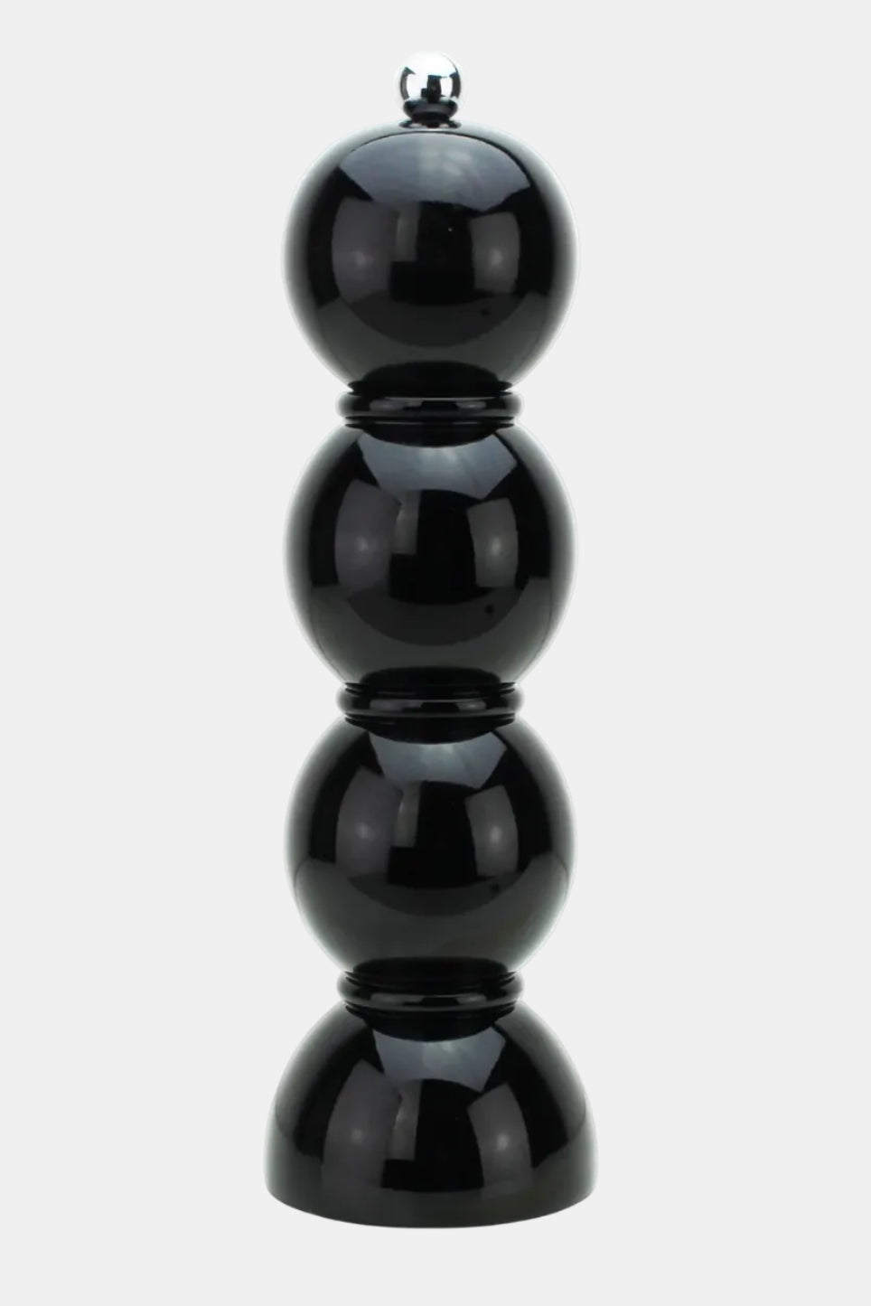 Black pepper grinder on a white background