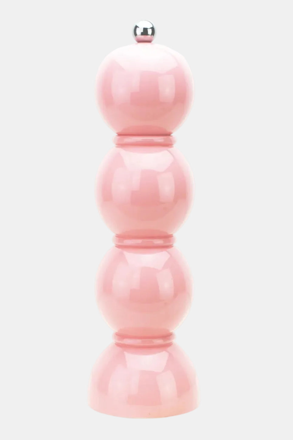 Pink pepper grinder on a white background