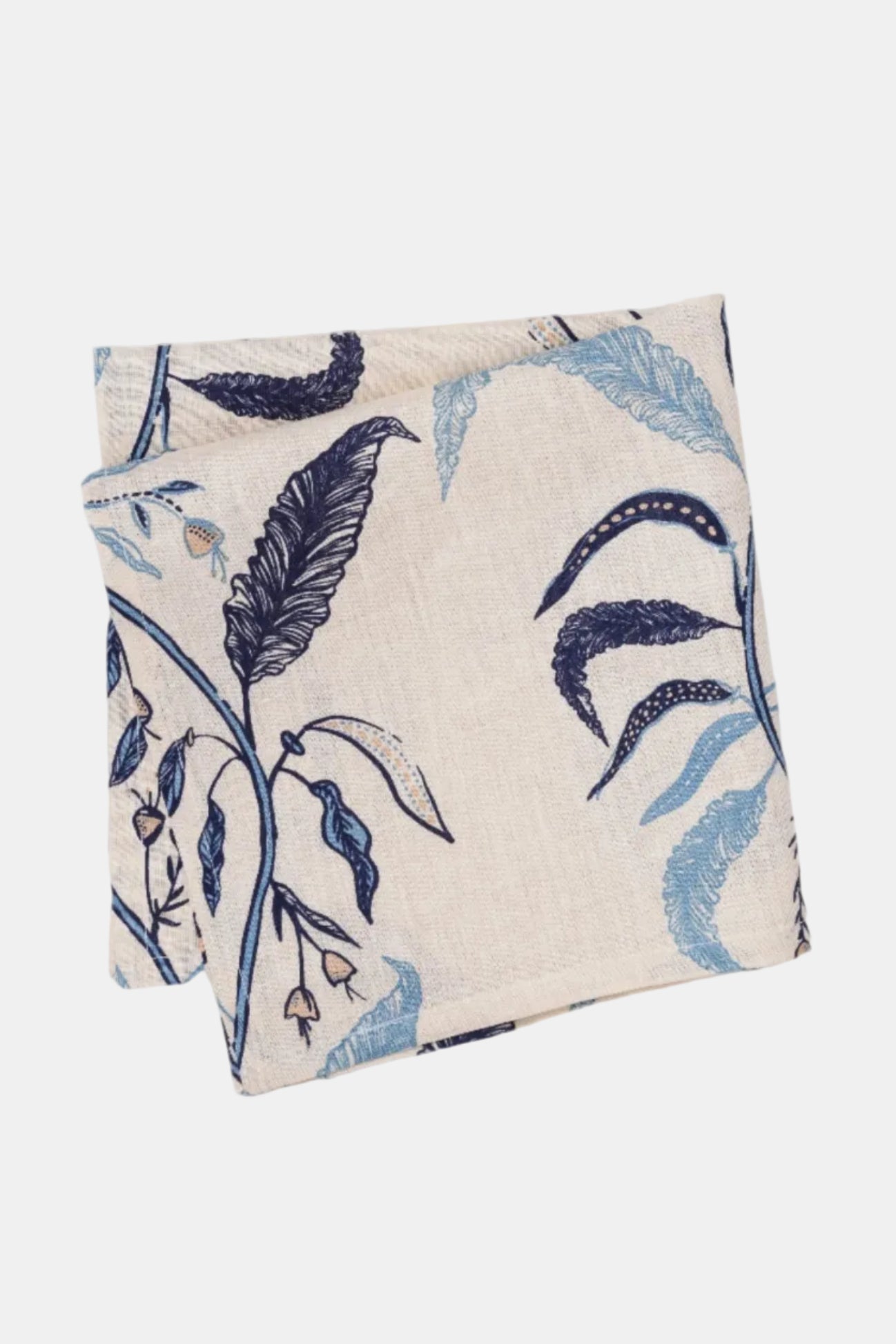Folded fabric with blue floral and feather pattern on a beige background