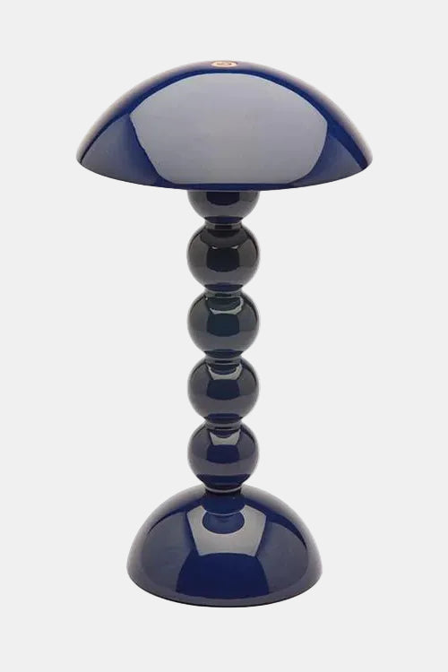 Blue and white decorative object on a white background