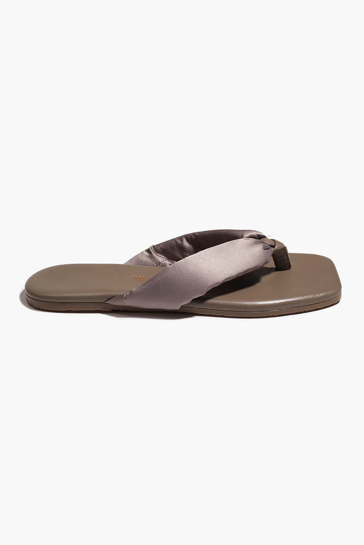 Pair of brown sandals on a white background