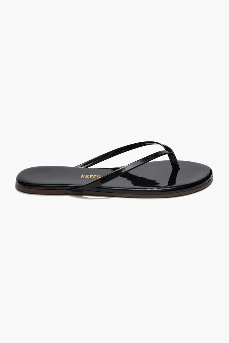 Black sandal with a visible brand logo on a white background
