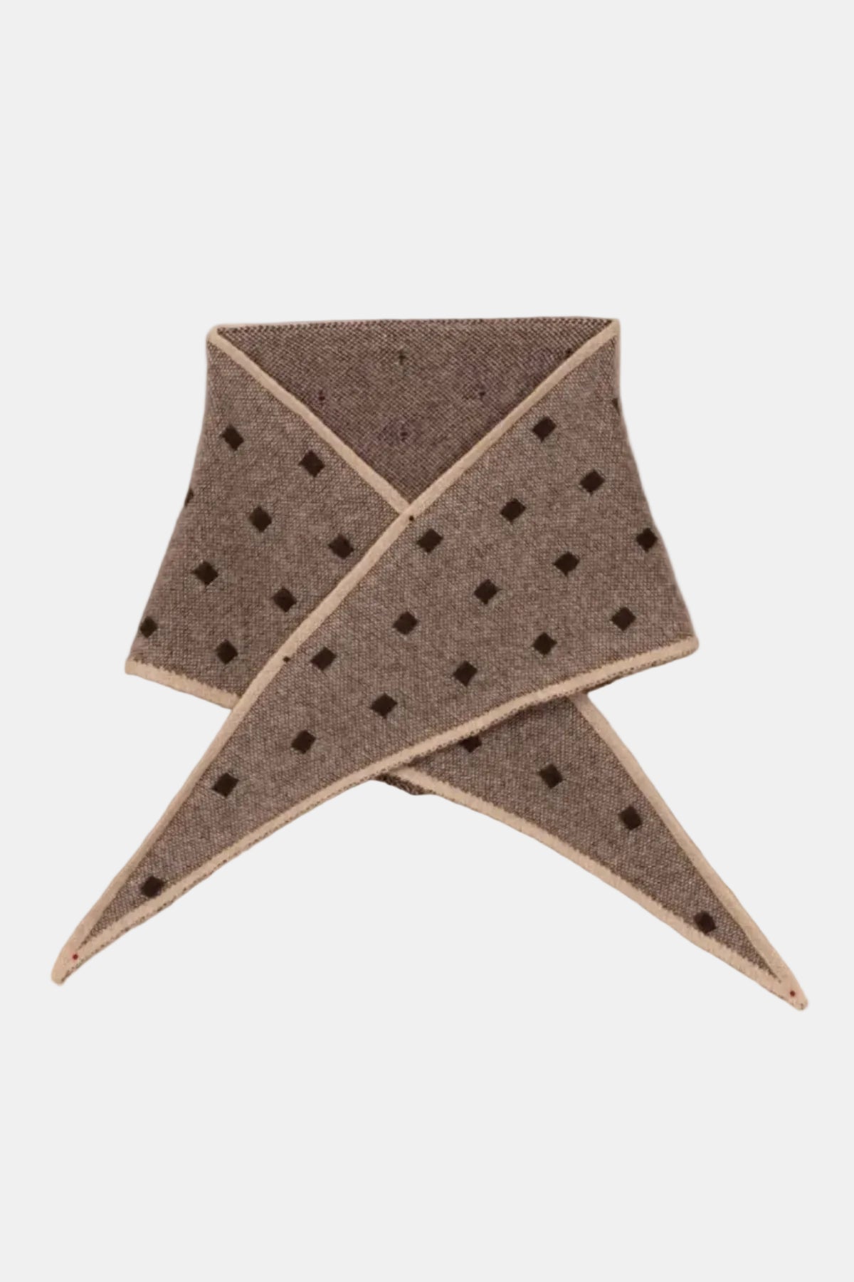 A folded brown woven fabric accessory, likely a pocket square or scarf, featuring a black diamond pattern and beige edges, laid flat on a textured beige linen background.
