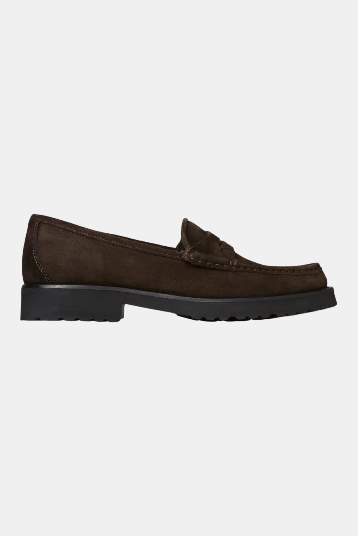 A single UGG slip-on loafer in tan suede with a light brown faux-fur lining visible at the collar, shown in side profile against a plain white background.