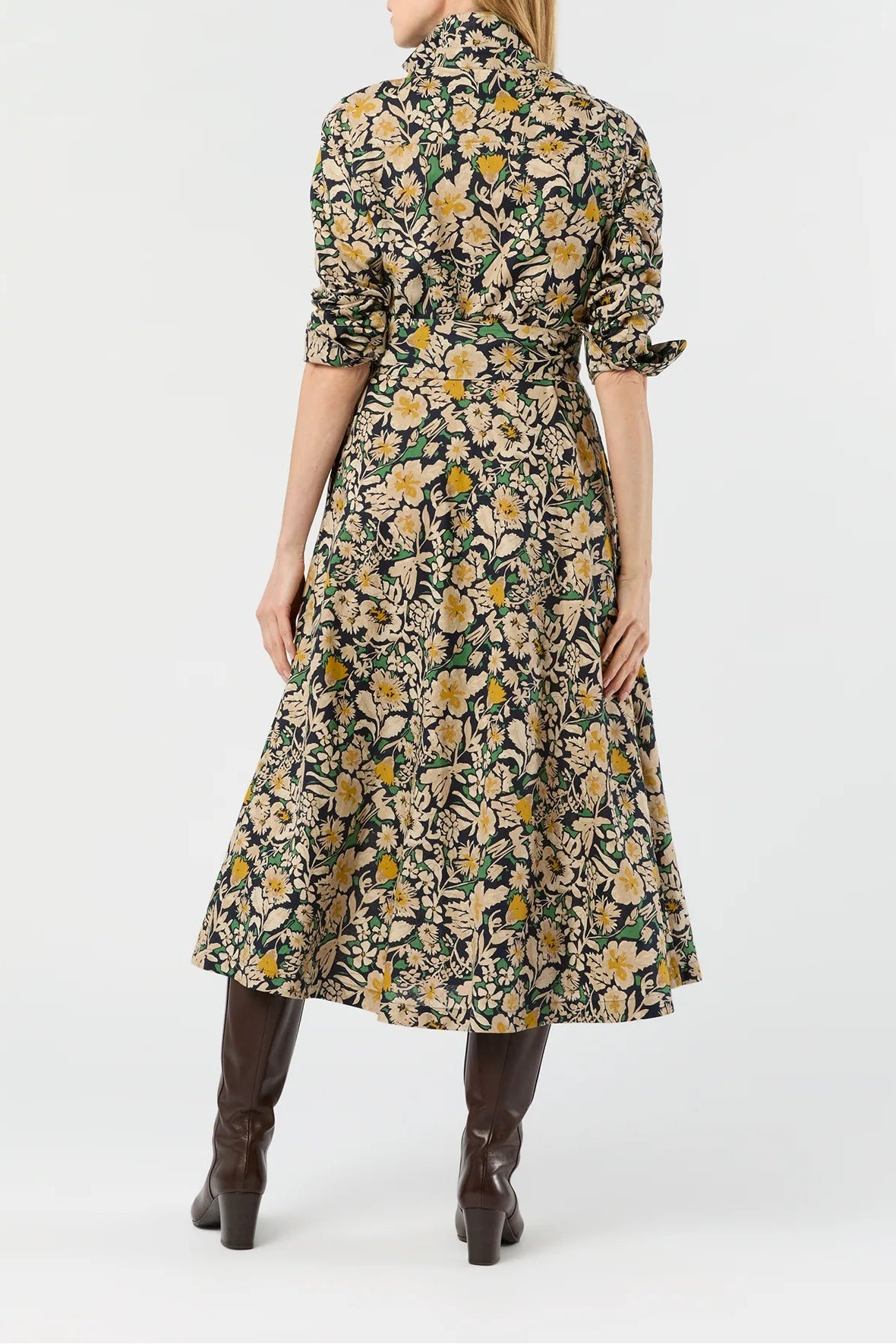 Woman wearing a floral dress on a white background