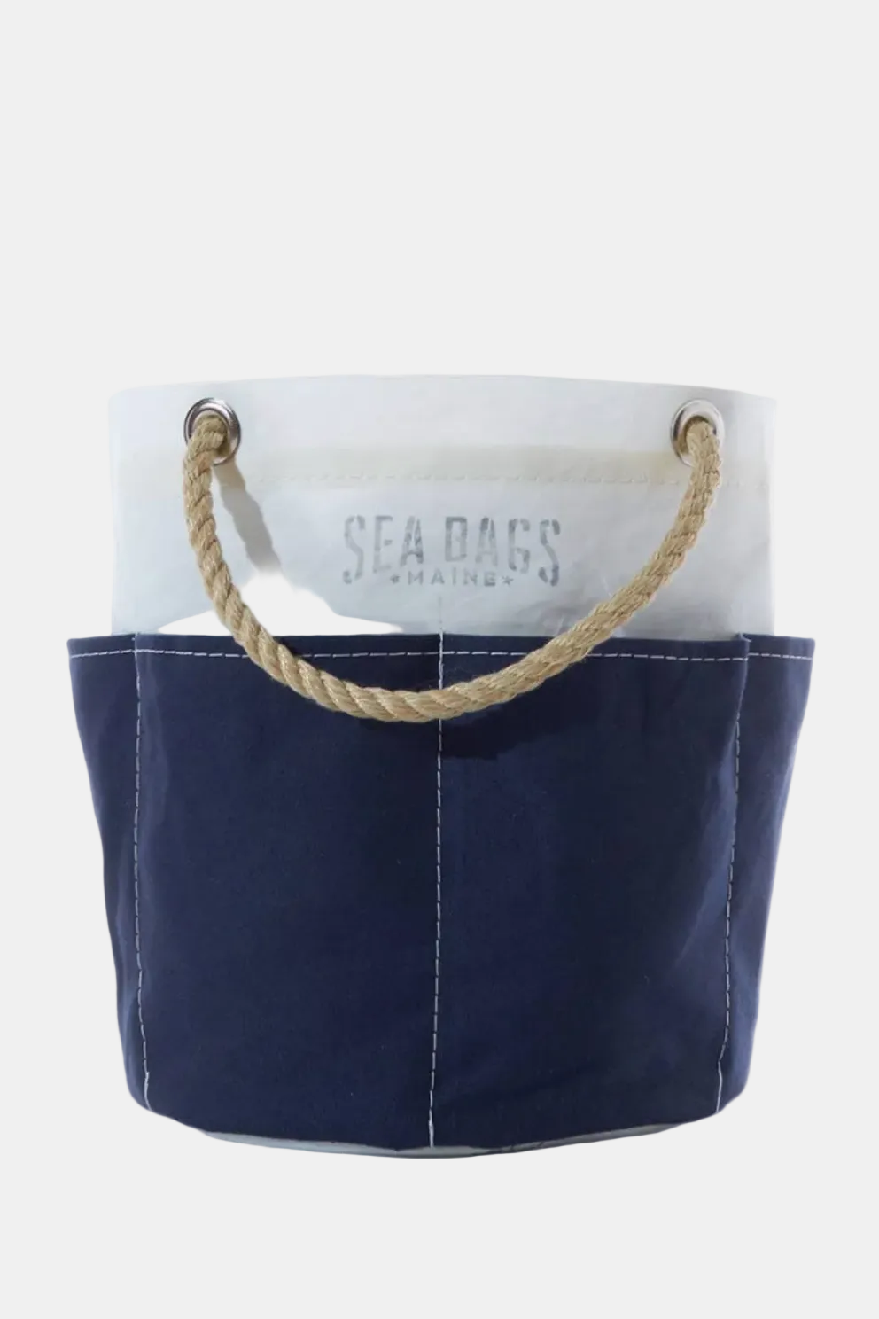 Navy blue and white tote bag with rope handles on a white background