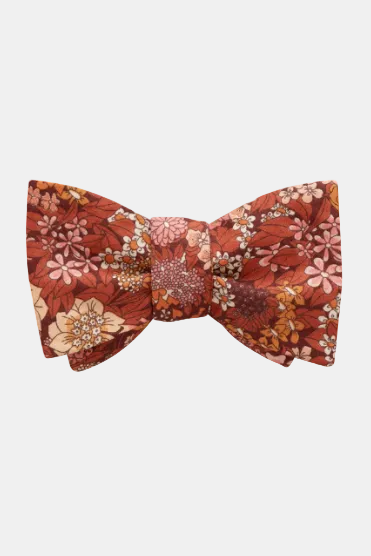 Floral patterned bow tie on a white background