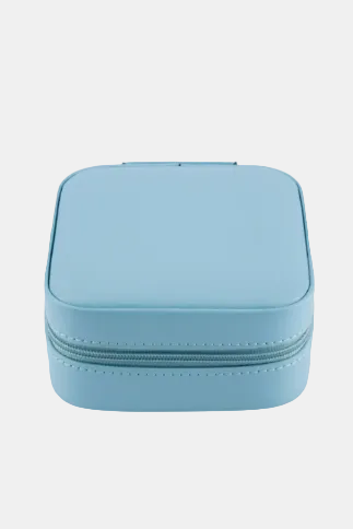 A light blue zippered jewelry case with rounded corners and a smooth finish, shown from a top-down view on a white background.