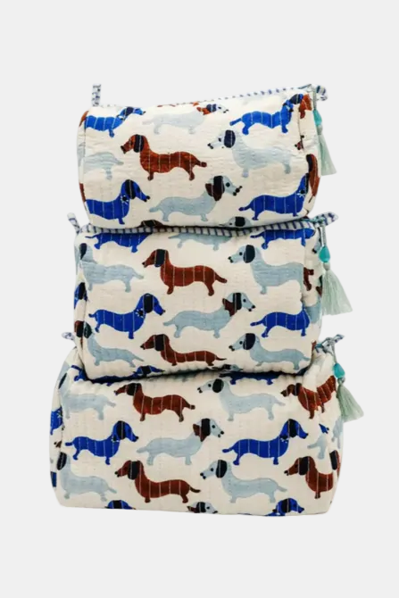 Set of three fabric bags with dachshund pattern on a white background