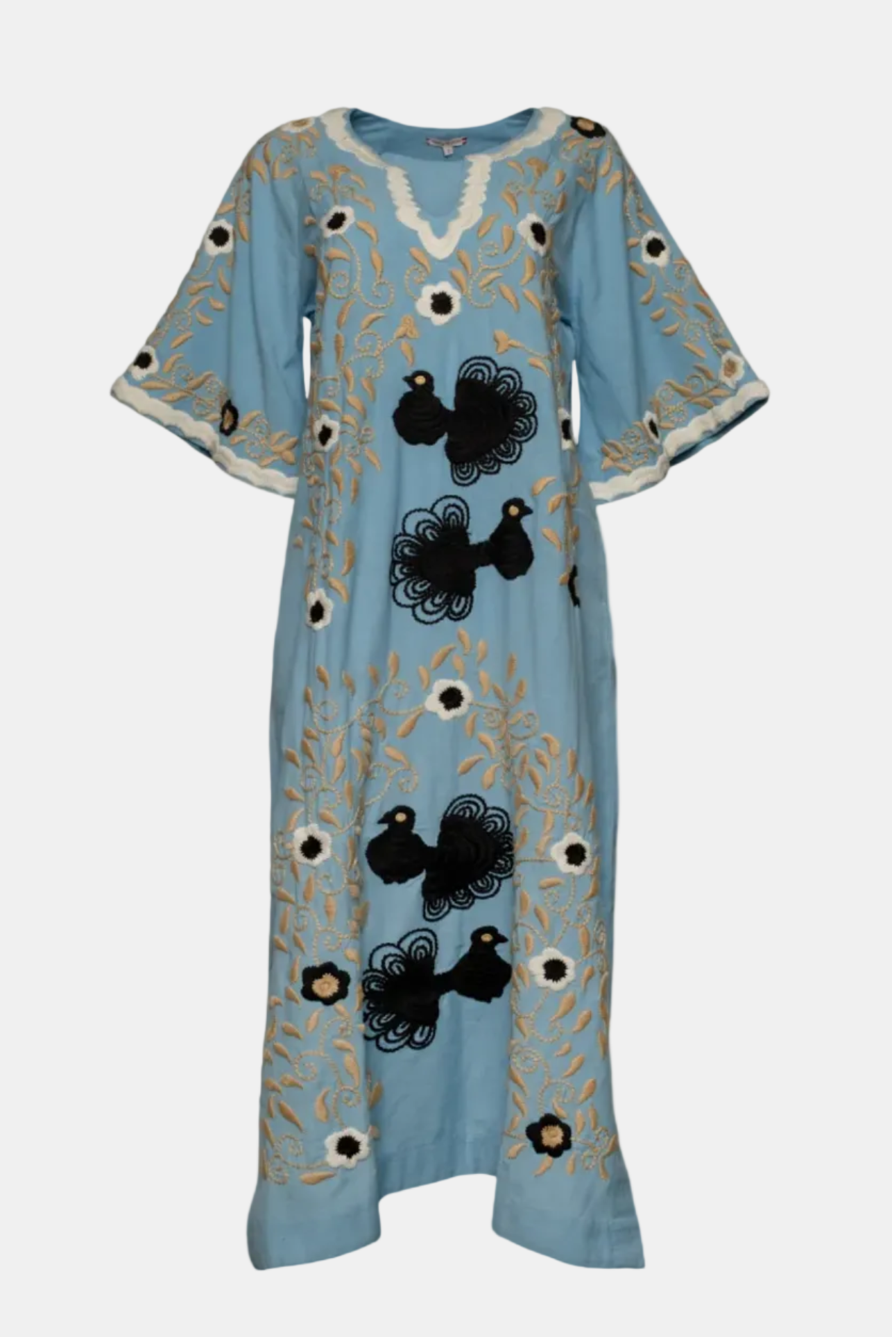Blue dress with black floral patterns on a white background