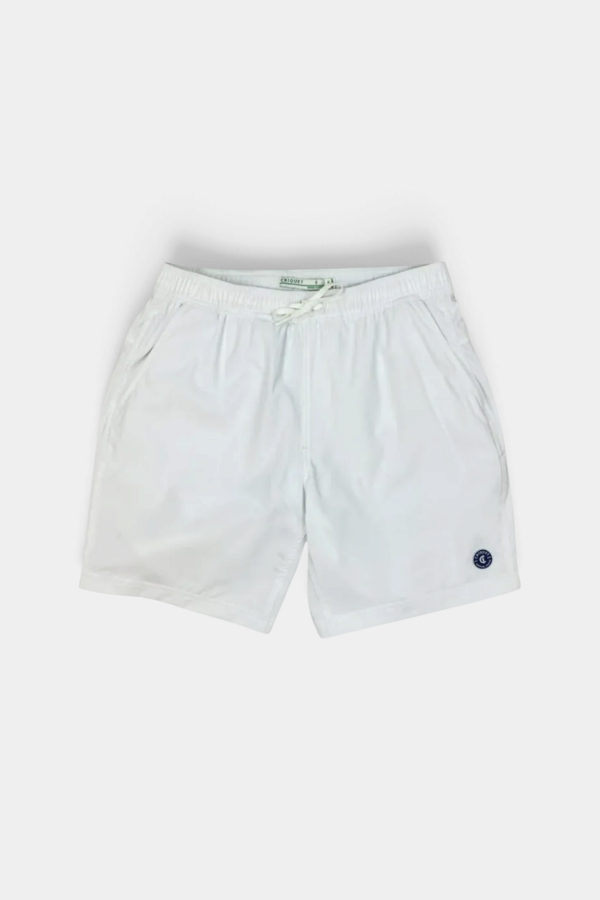 White shorts with a small logo on a white background
