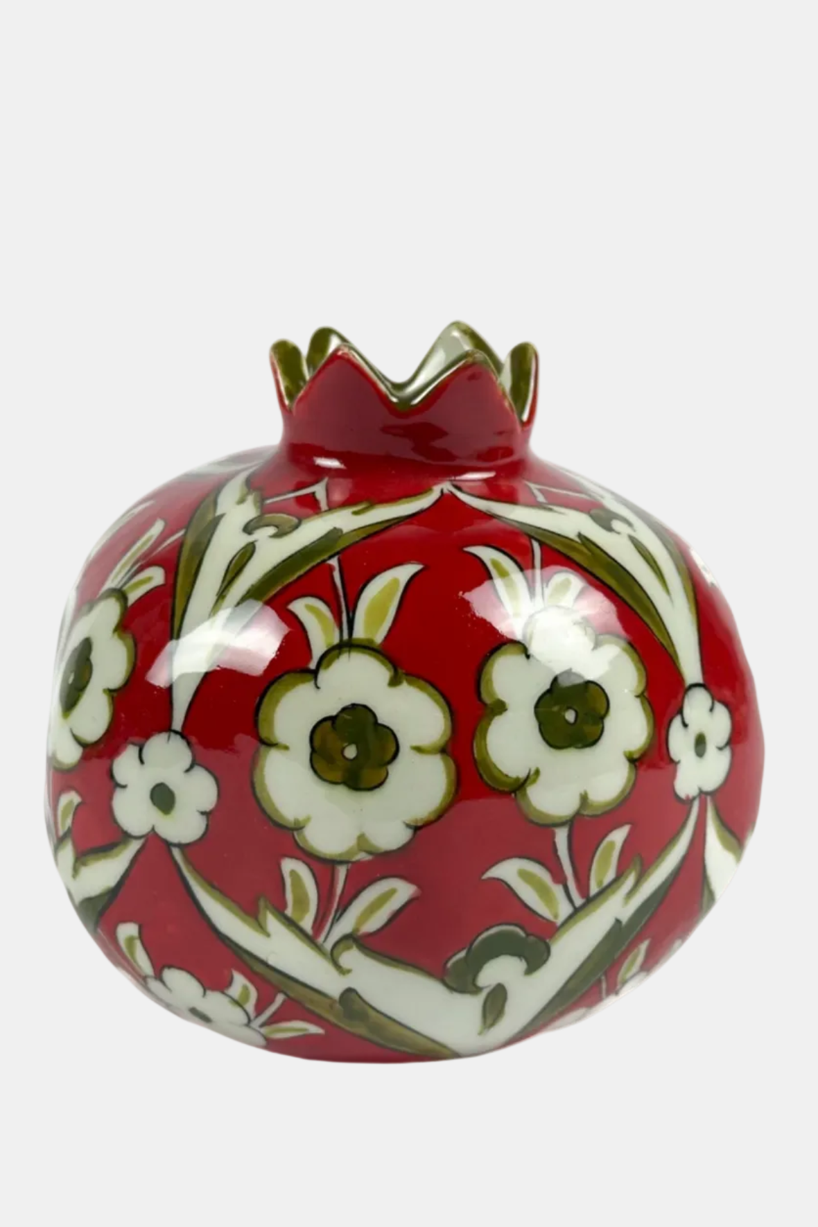 Decorative pomegranate with floral patterns on a white background